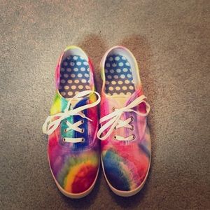 A tye- dyed  pair of shoes